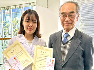 堀口さんと指導の大江先生